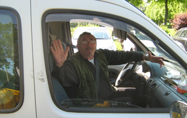 the elderly gentleman sat in his white van, waving his goodbye to me
